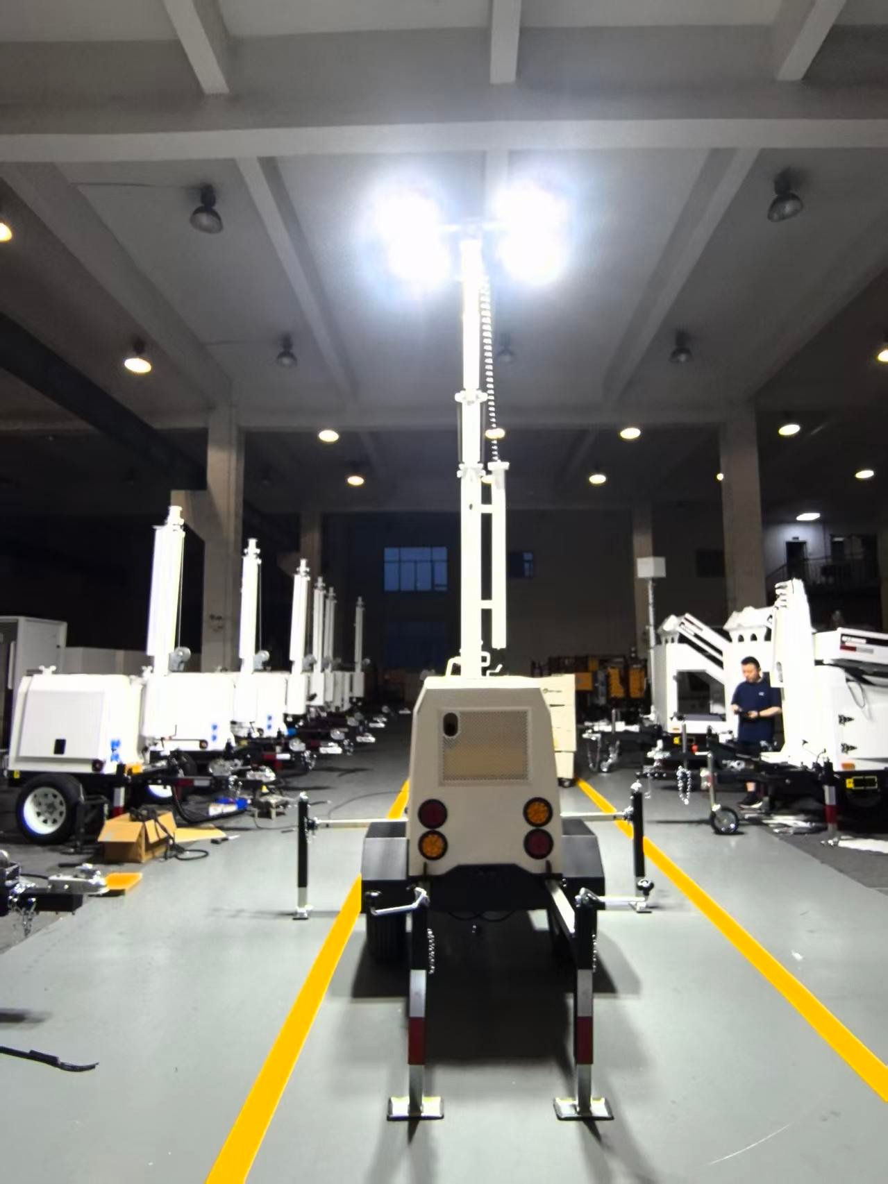 Mobile light tower lamps illuminated